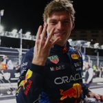 Max Verstappen Claims Victory Over Fernando Alonso in Rain-Delayed Finish