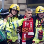 Liverpool Celebration Ends in Fear: Car Hits Crowd, Dozens Injured!